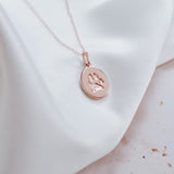 Rose gold oval paw print charm jewllery 